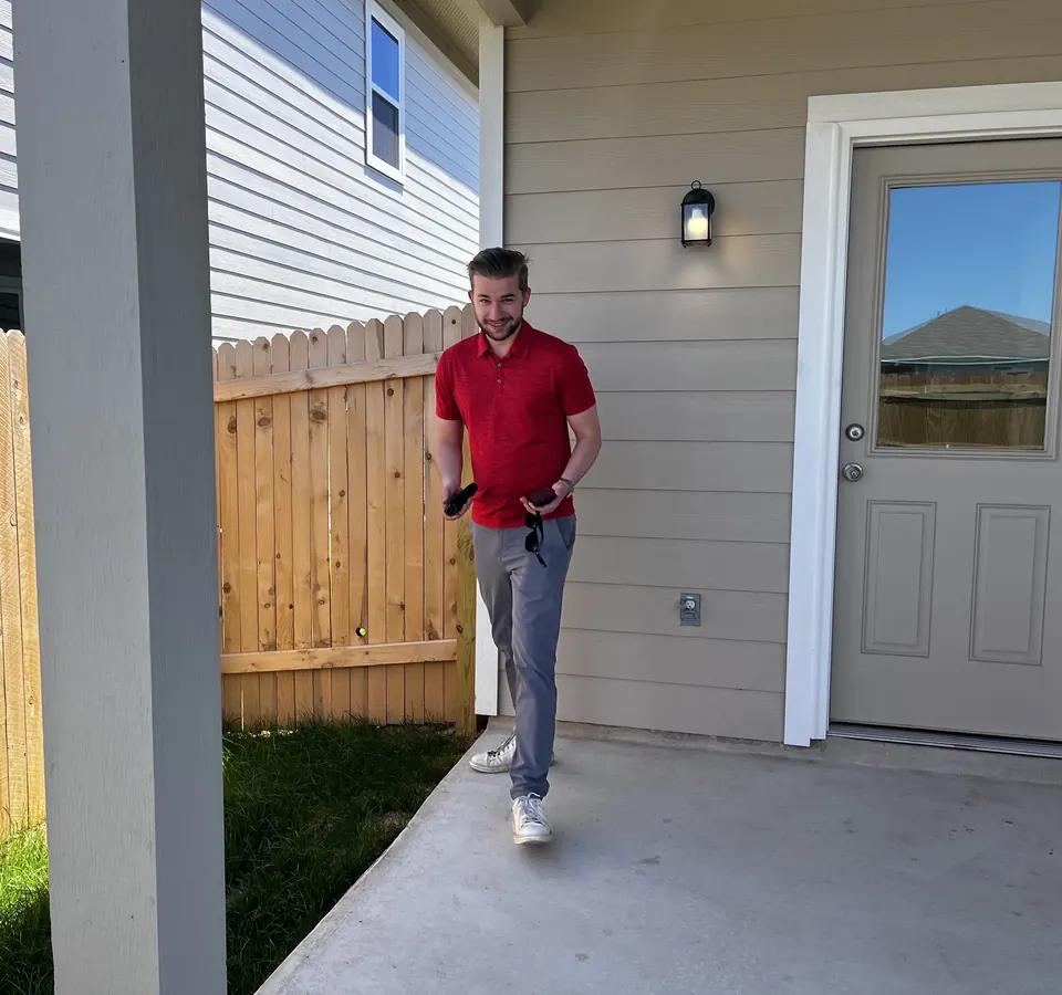 An RSDS appraiser inspecting the back patio of a home