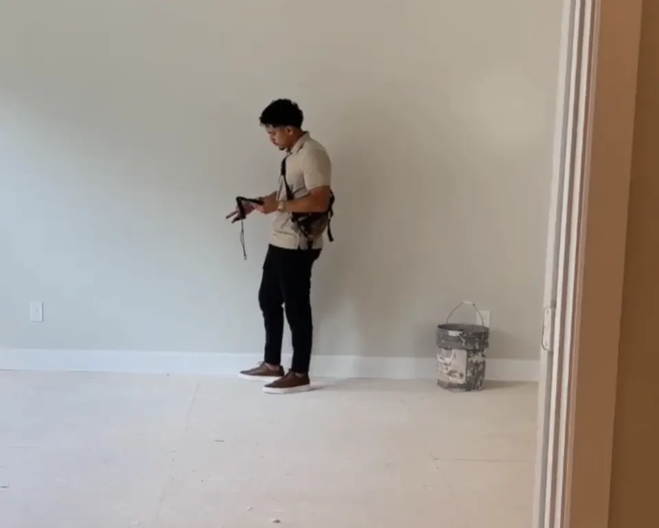 An RSDS appraiser inspecting an interior room